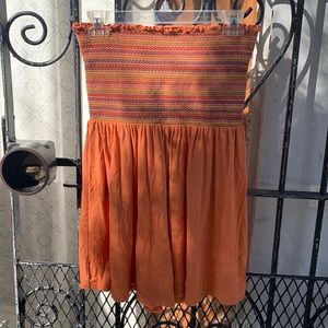Strapless orange smocked romper